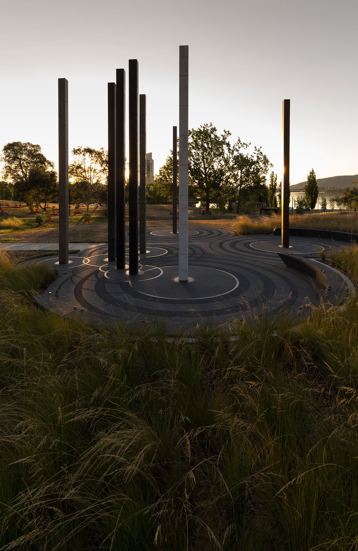 View from the grassland showing the National Workers Memorial sculptural pillars.